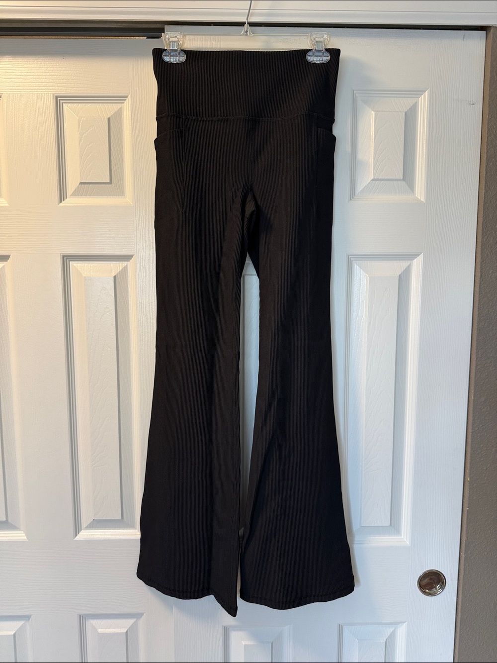 Athleta Black Salutation Stash Rib Flare pant